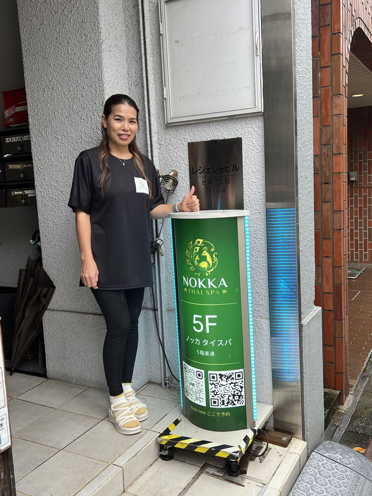 Nokka Thai Spa sign at the Legend Building entrance